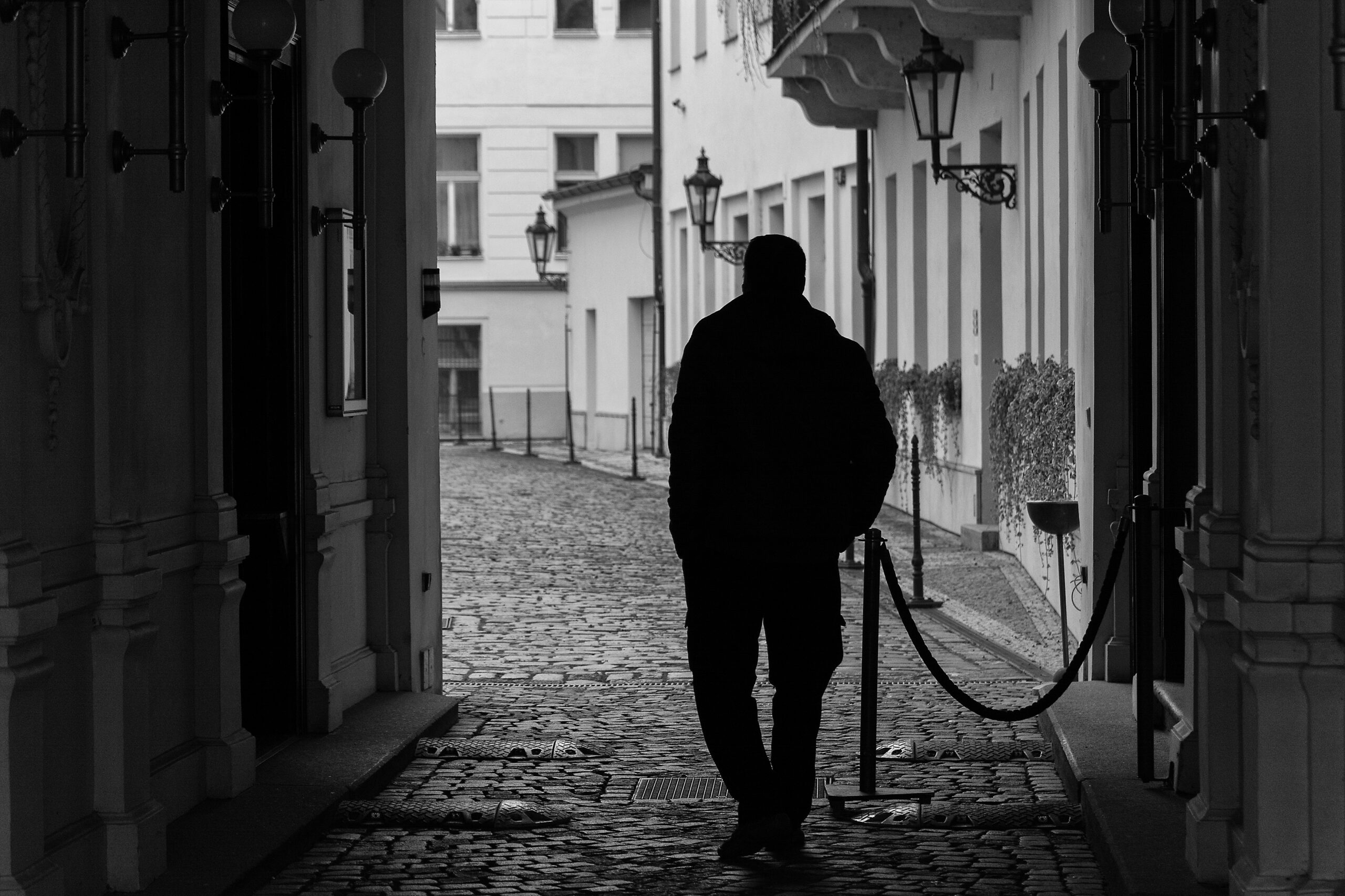 silhouette of lonely man on the street
